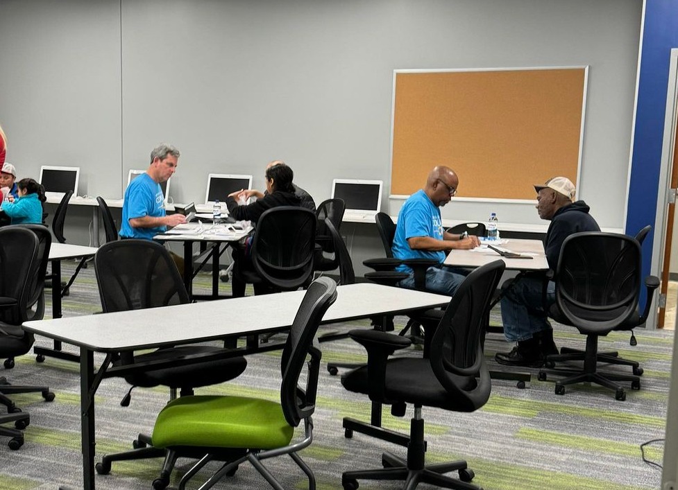 John and Darrin helping folks file their taxes for free at one of our VITA Super Saturday events